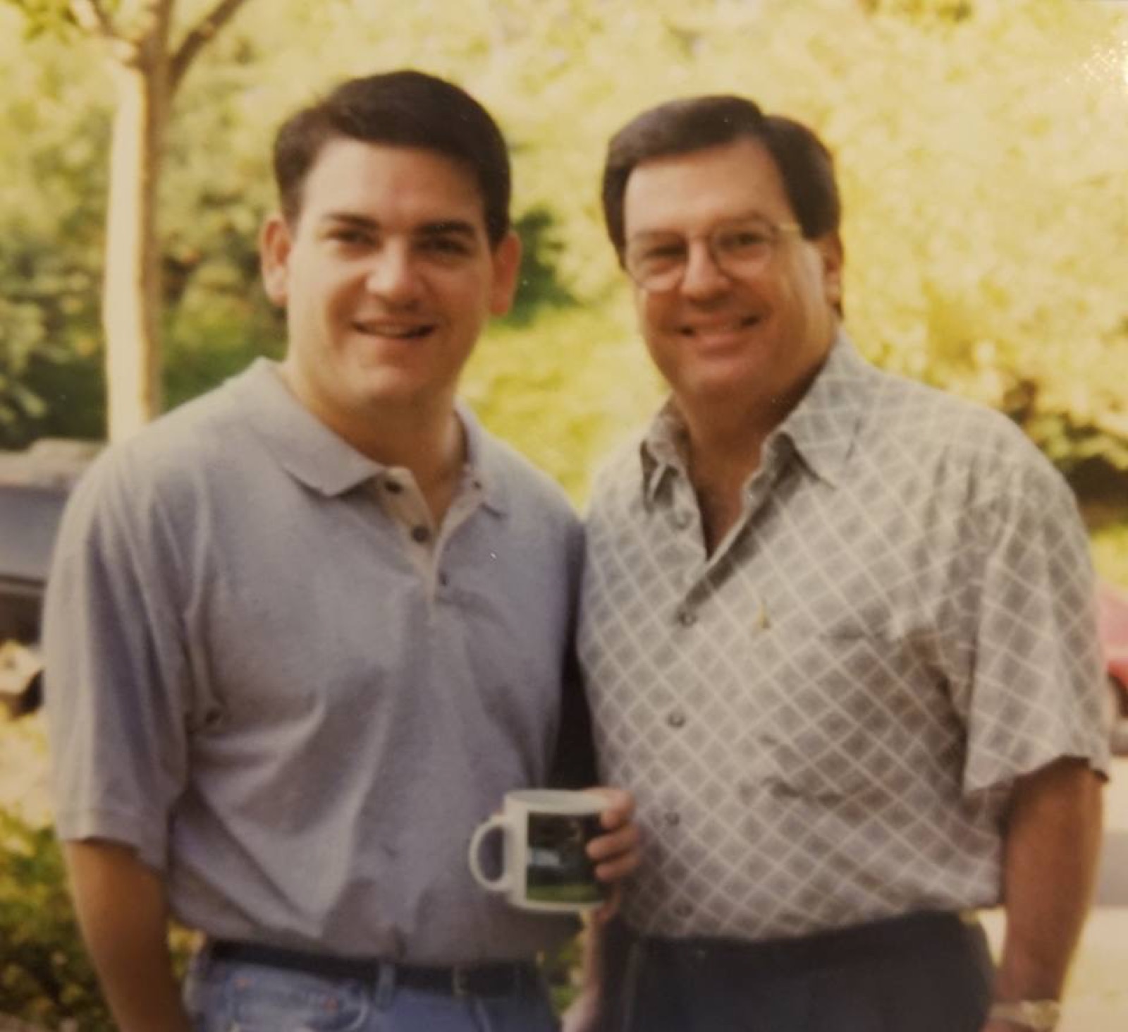 A young Michael Bennett with his father, whose Commodore 64 started it all