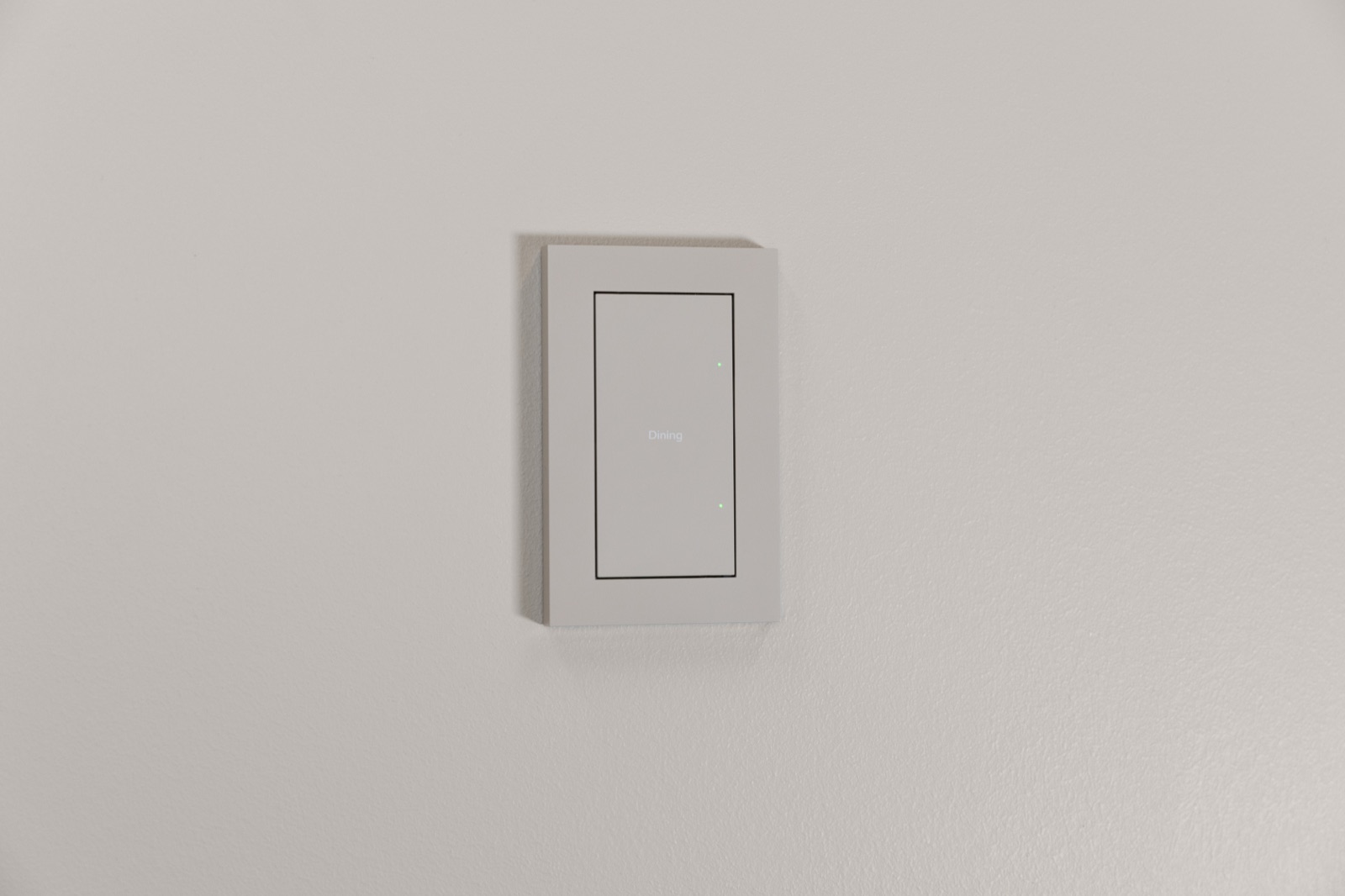 A Control4 dimmer on a wall