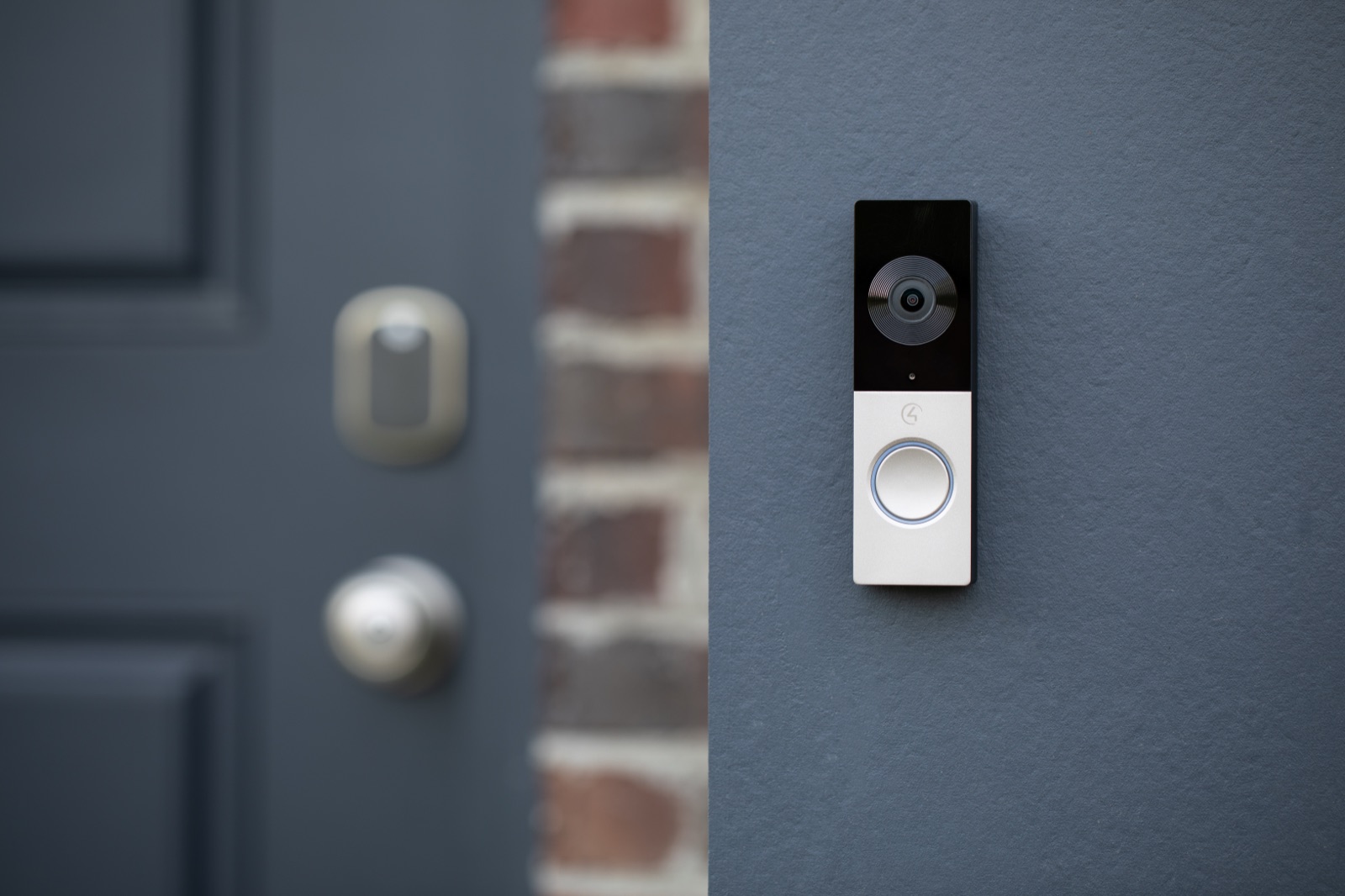 A Control4 Chime video doorbell at a front door