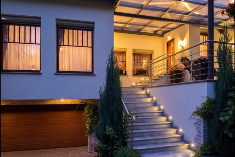 Outdoor area with controlled lighting