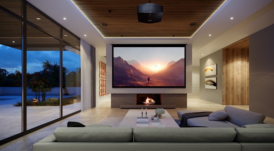 a media room design with three TV screens on the wall with a gray sofa and a shelf 