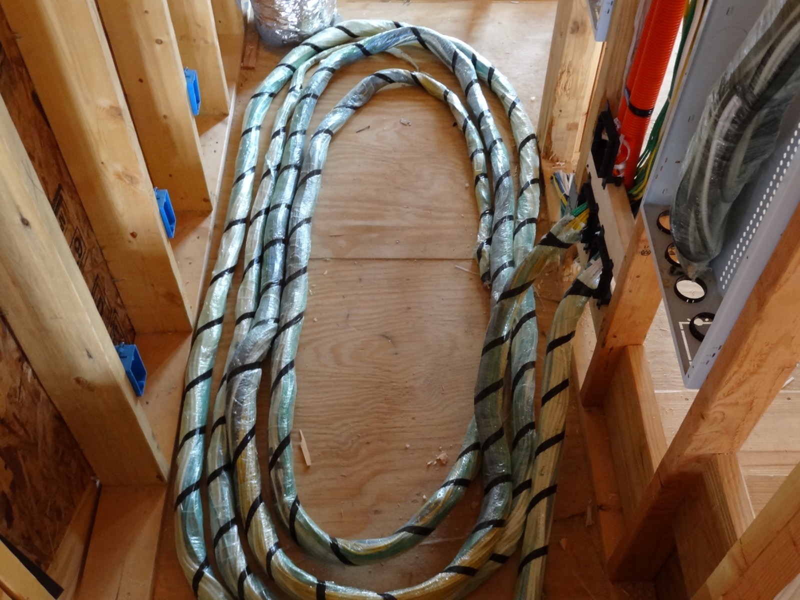 Coiled structured wiring runs during construction