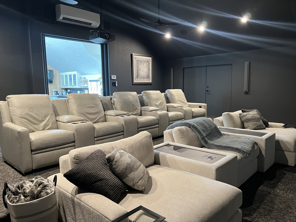 Kingsland dedicated home theater with tiered seating, installed by Bennett Technologies