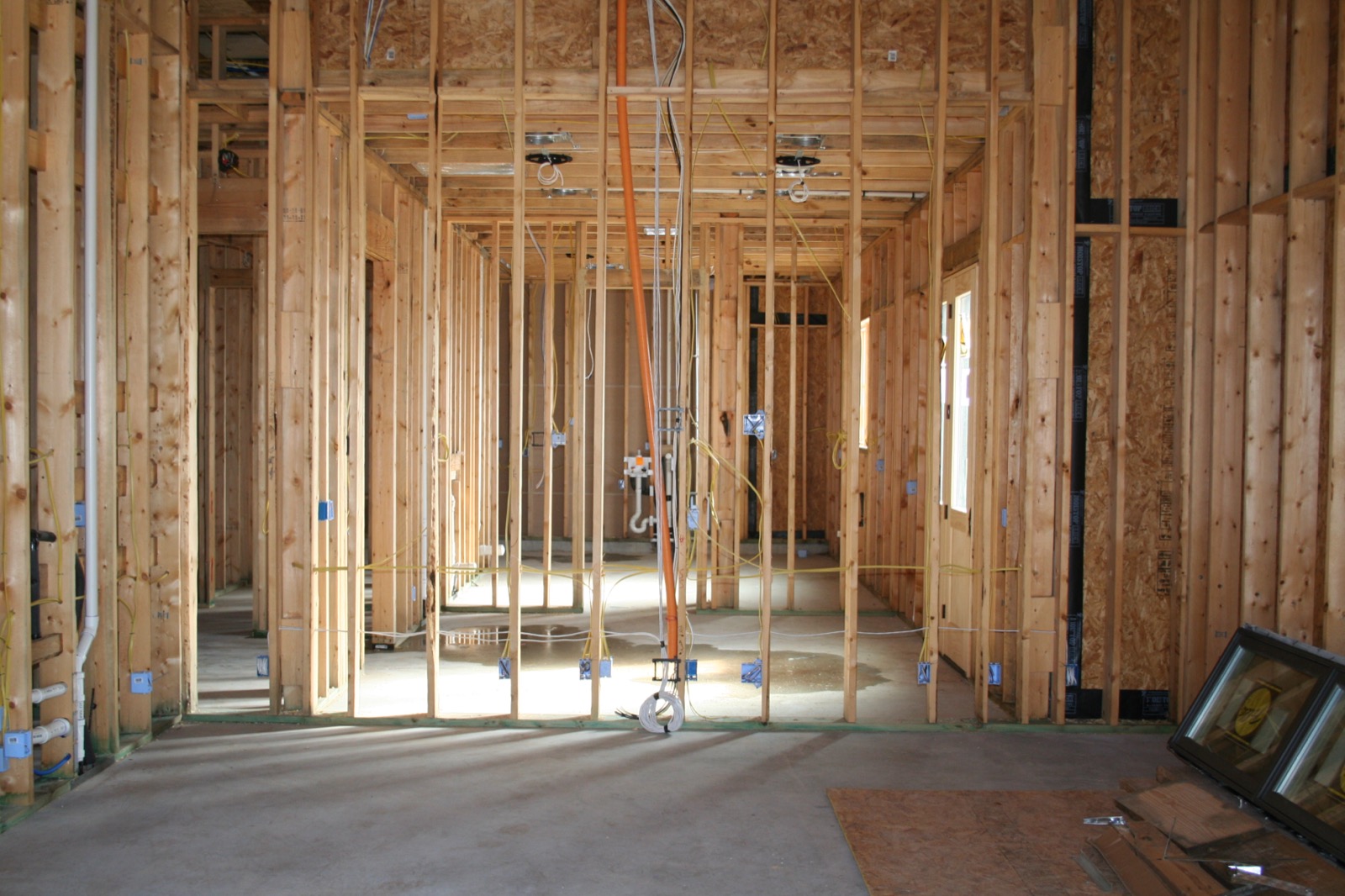 Low-voltage cabling run past batt insulation
