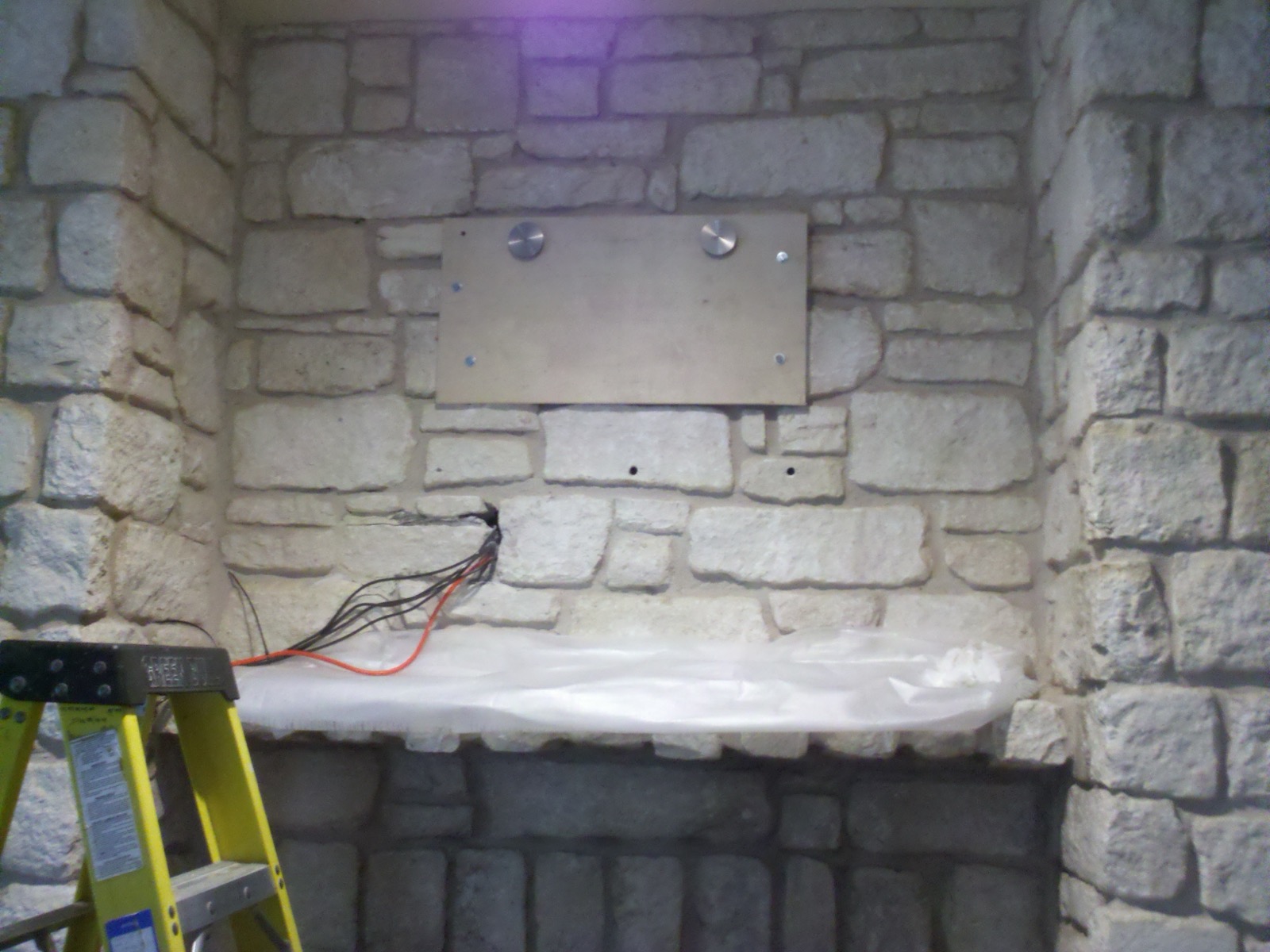 Westlake Custom TV on Rock Wall