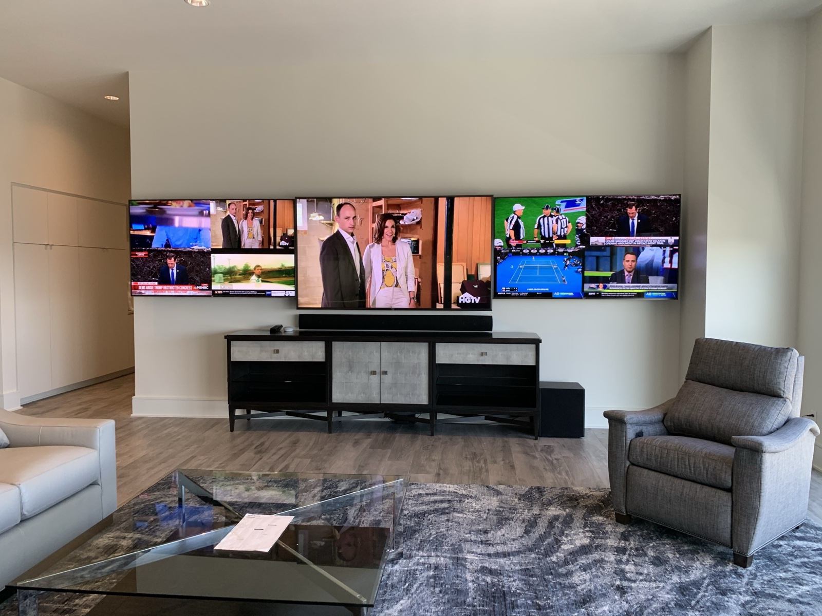 The finished video wall as a whole: tiled programs on the left and right displays around the center screen and soundbar