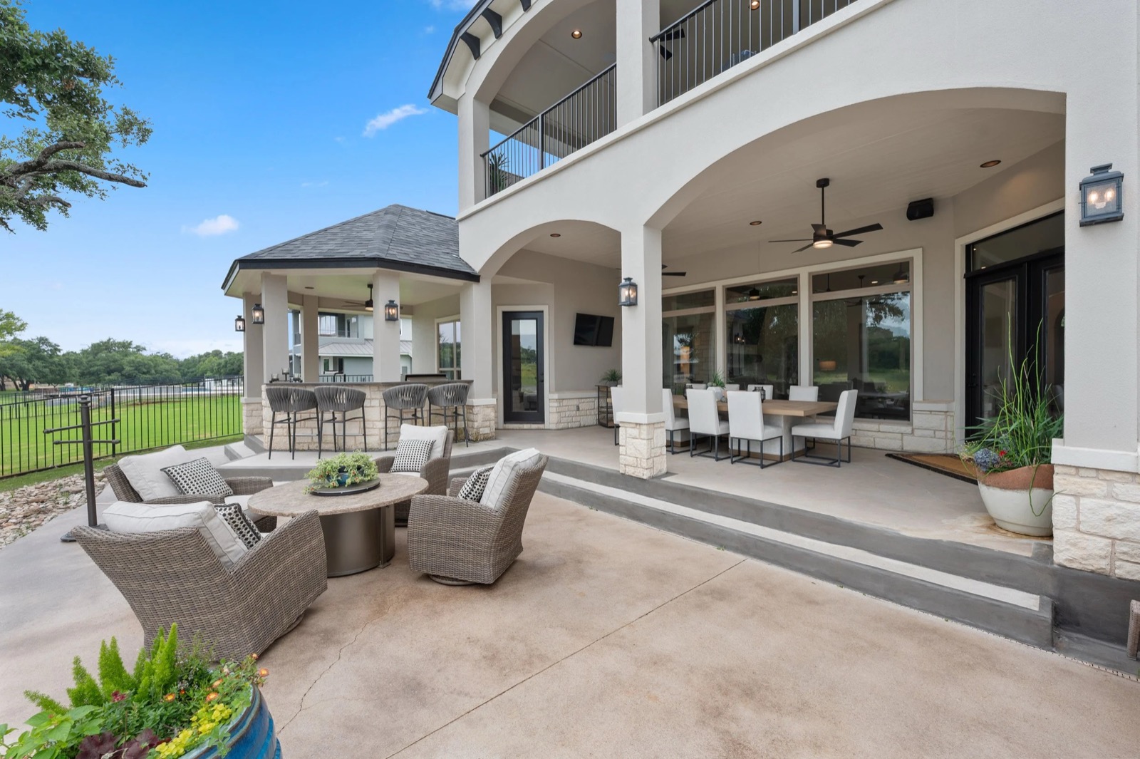 Covered patio with outdoor TV installed by Bennett Technologies